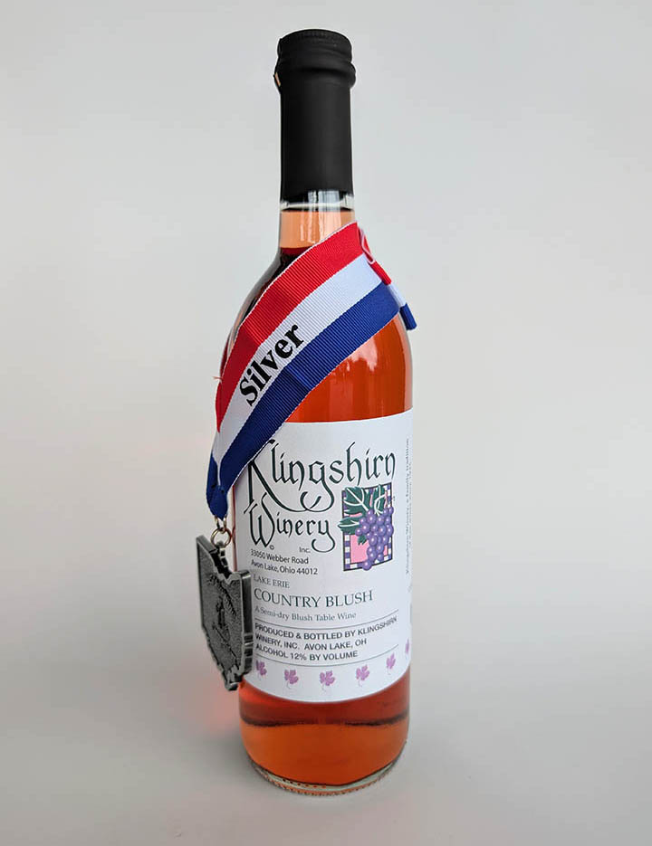 A bottle of Country Blush wine