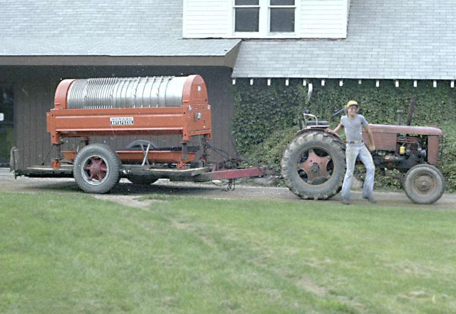 Lee Klingshirn moving a grape press with a Case tractor
